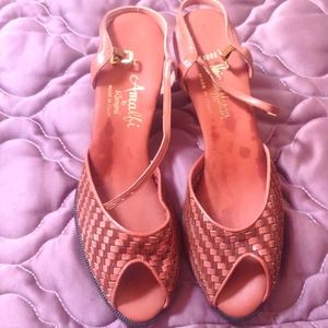 Amalfi fire Neiman Marcus heels